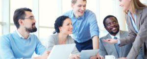 Management team discussing ServiceNow Employee Workflows