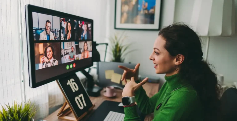 Businesspeople discussing business on virtual staff meeting