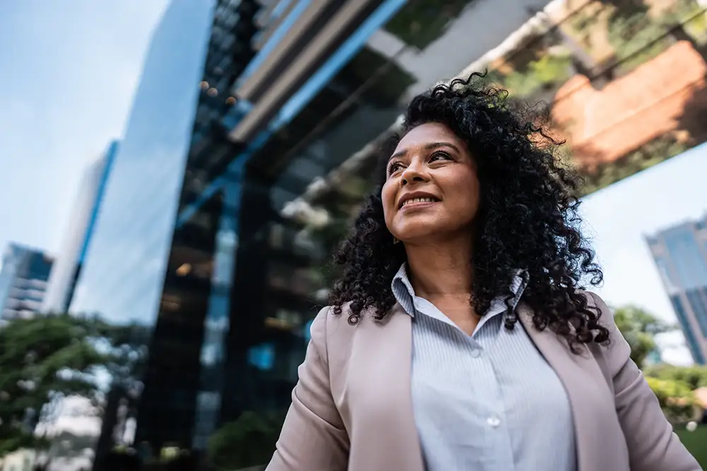 business-vision-2023150007 Mature businesswoman looking away contemplating outdoors